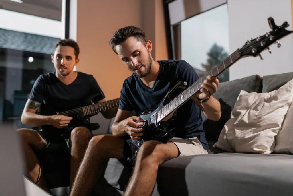 brothers playing music together