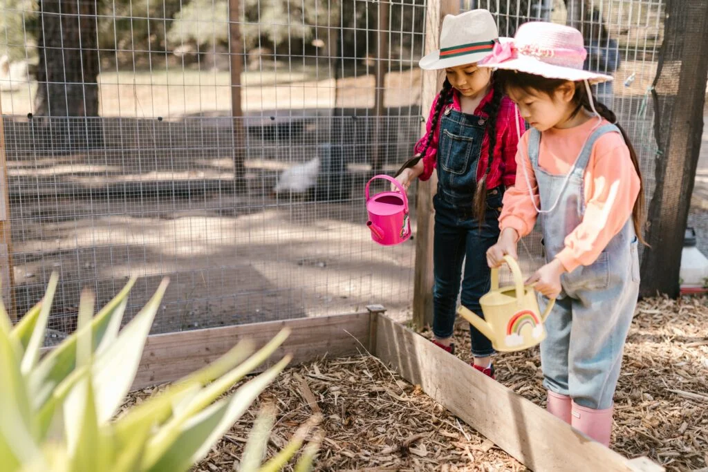 sisters are gardening togehter
