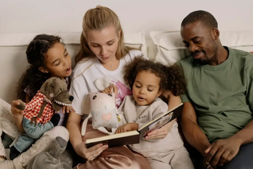 Parents give their time to theit children reading the books together